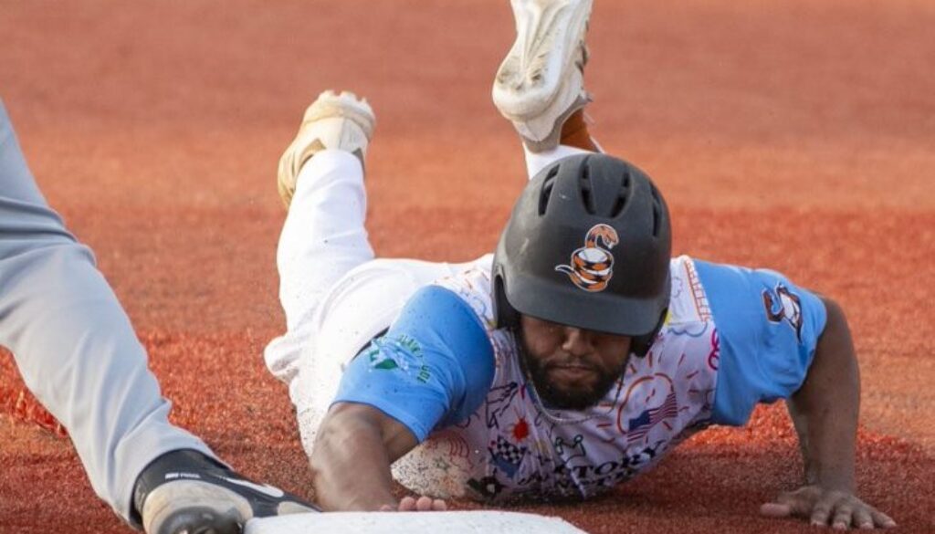 Trevor Marsh in CPL diving at first base2021
