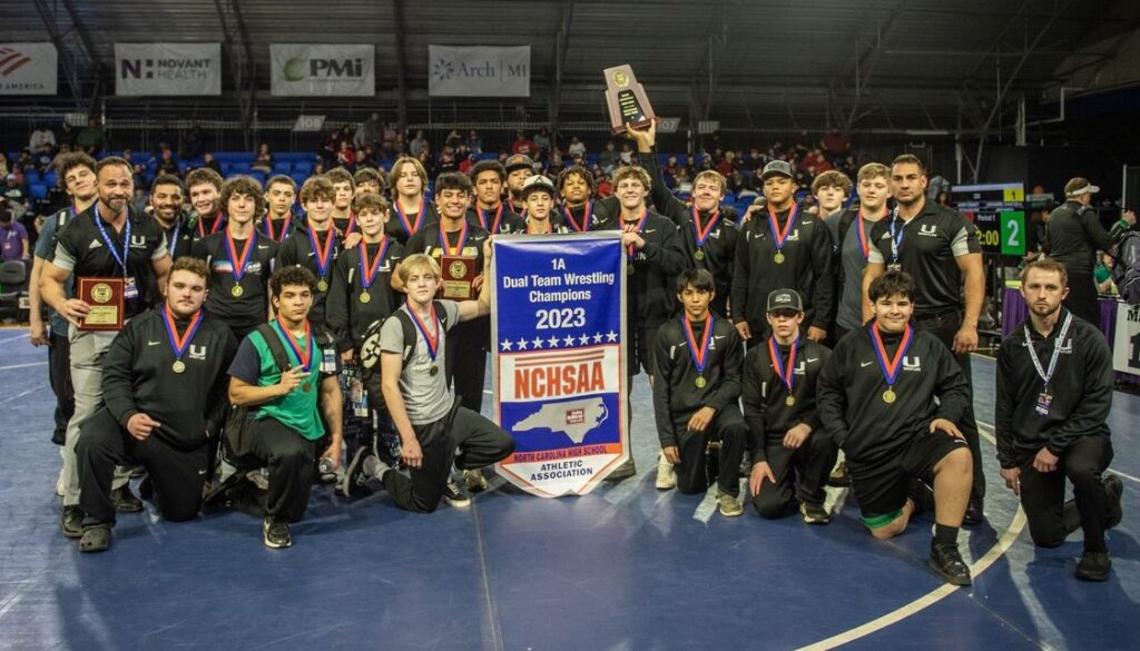 UCA wrestling team photo after winning 2023 state duals