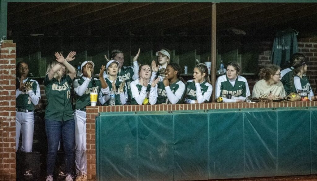ER softball team in dugout spring2023